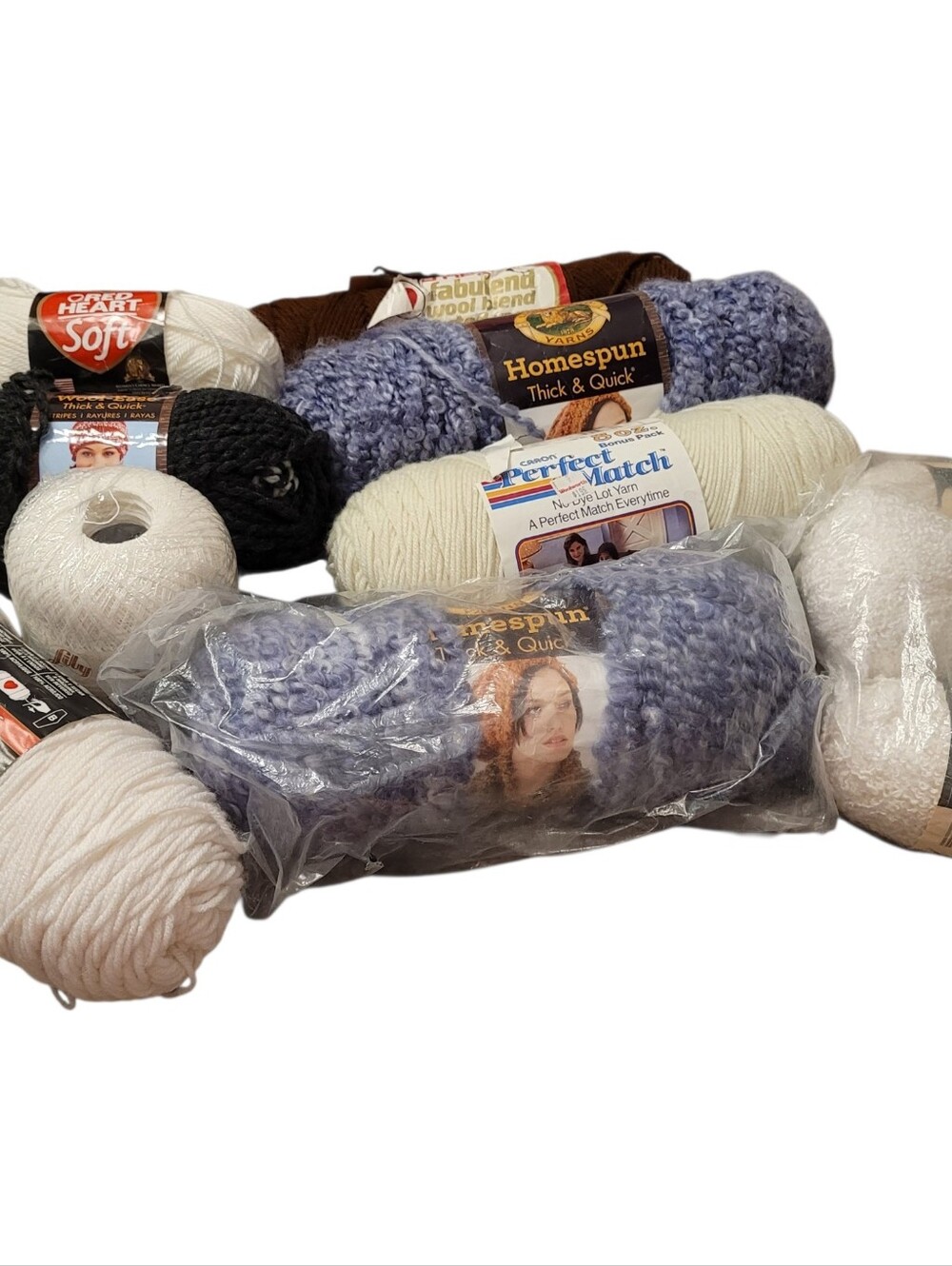 Lot 12 Skeins Of Yarn.  New and New OS Lions Brand Red Heart etc Purple White..